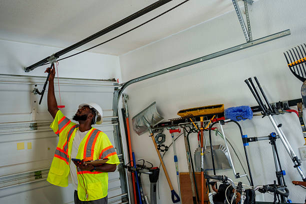 Professional Garage Door Panel Replacement technician working in Blue Mountain, MS